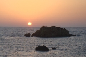 Solnedgång väster om Korfu